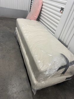 Twin size cushion and under piece with pillow is very clean always in plastic