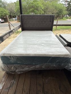 Gray queen, size bed frame with diamonds mattress, and boxspring