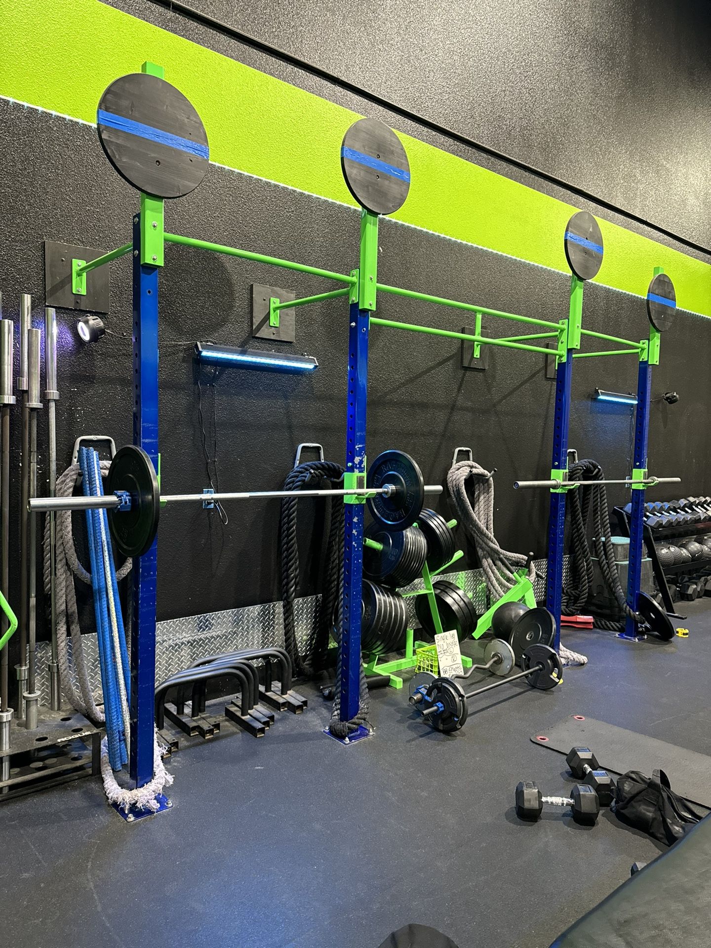 Squat rack Bench Press TRX Pull ups Medicine ball toss Pulleys