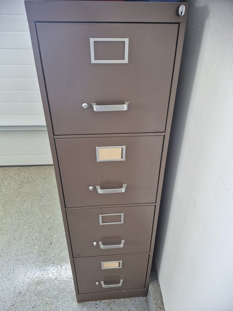 Title: 4-Drawer Metal File Cabinet – Fair Condition