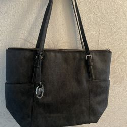 Black Michael Kors, purses there are two posted. Both are imperfect condition no damage inside or out no stains or odor prices for one purse 