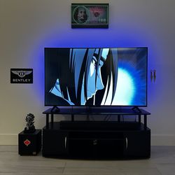 55” TCL 4K Smart TV + Vizio Soundbar + Subwoofer + TV Stand