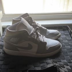 Jordan 1s, size 12men 11 woman, grey and white.