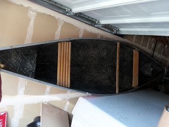 14 ft Red Canoe with Oars and life jackets
