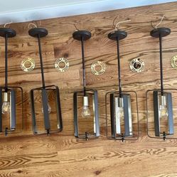 5 pendent lights, like new with mounting hardware and Edison LED bulbs, take all 5 lights $100 