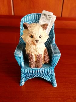 Cat in chair. 1980.