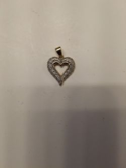 10k diamond charm ♥ 60$