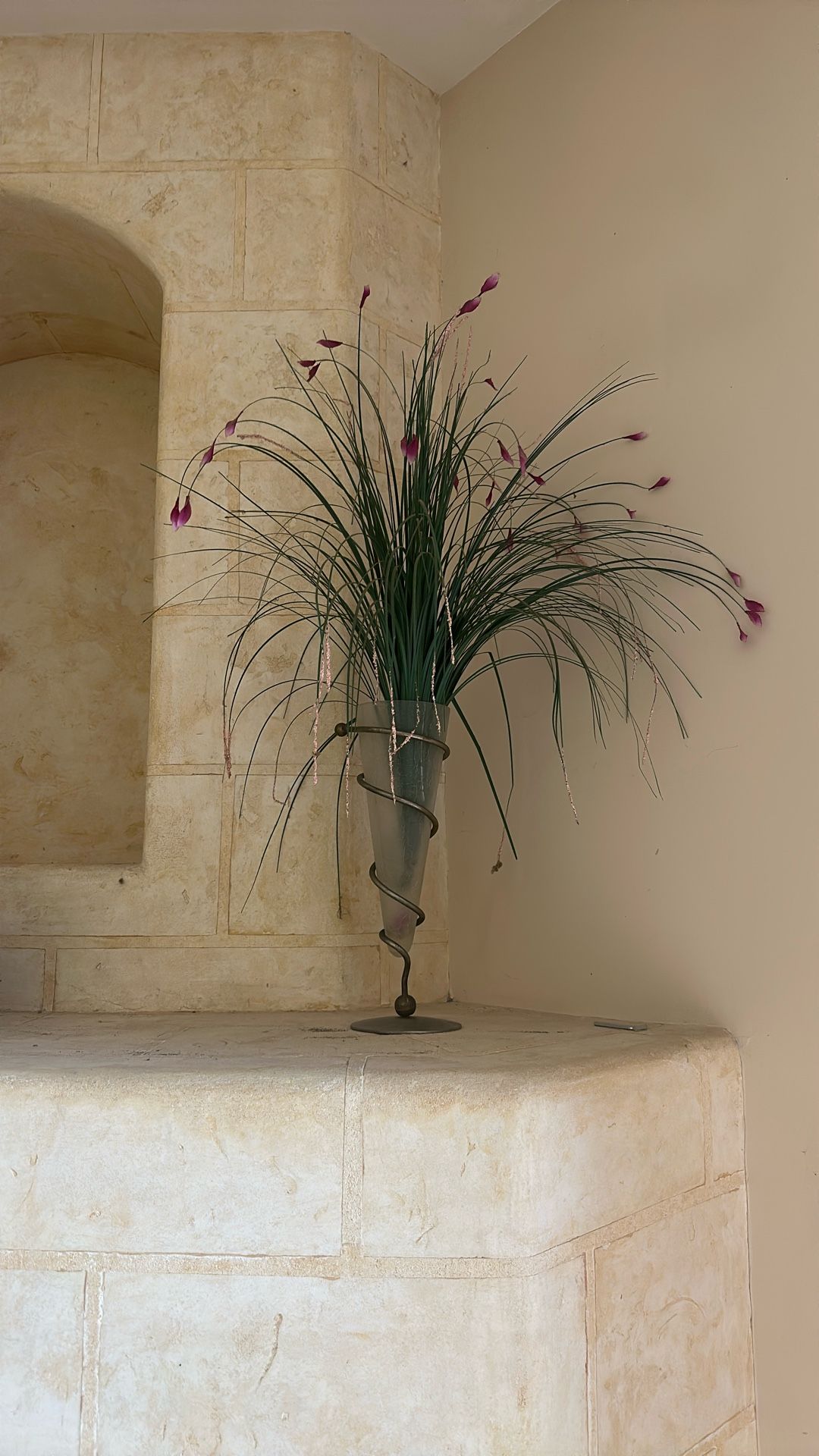 Glass vase with artificial flower