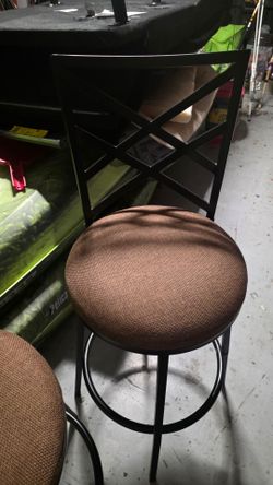 Set of swivel bar stools