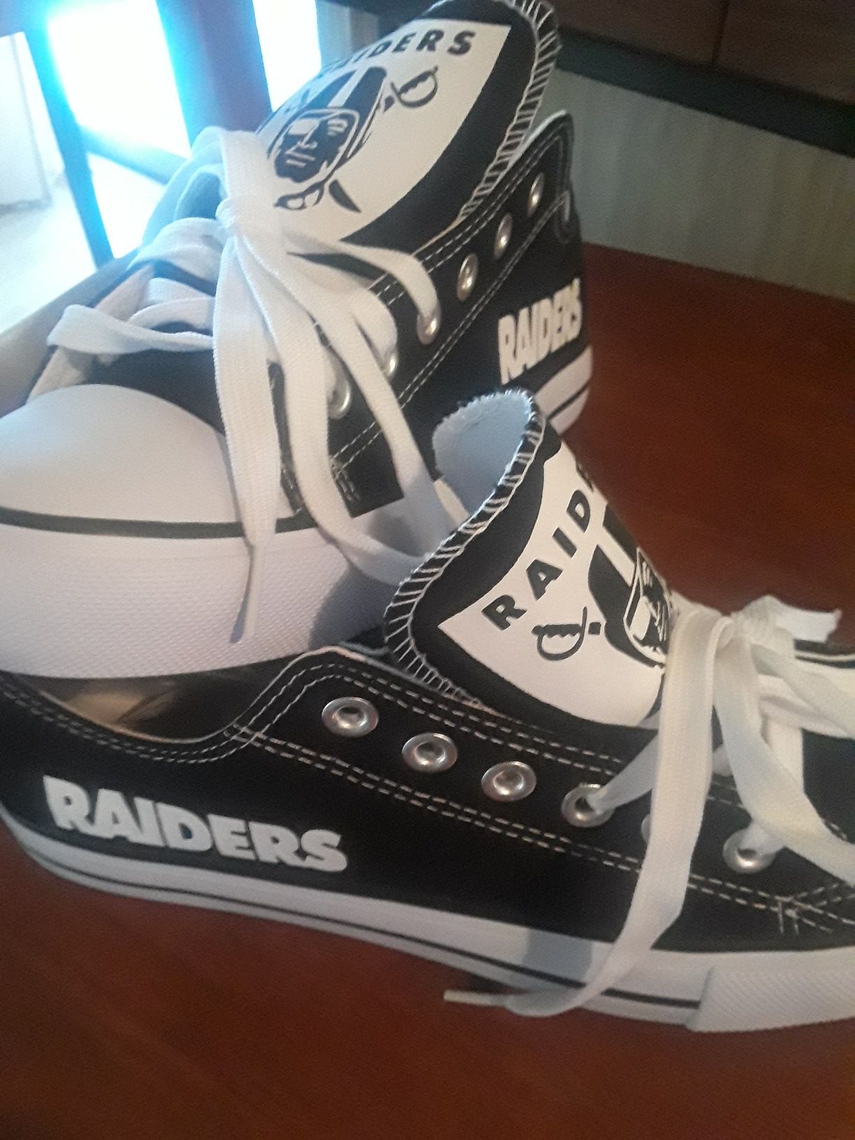 Raiders tennis new $25 each