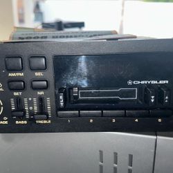 Jeep/Chrysler OEM Cassette Radio + Install Mounting Kit + Jeep Seat Cover Bundle