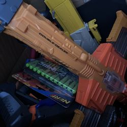 Box Of NERF Guns And Bullets