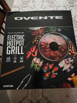 Electric hot pot/ grill combo. Still in box