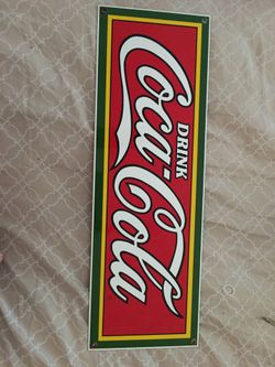 Porcelain over metal Coca-Cola sign
