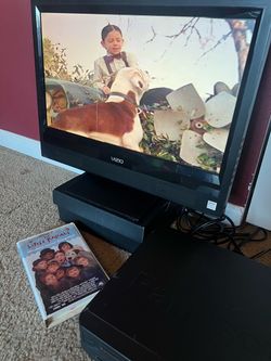 Flat screen Panasonic VHS player and Disney Movies