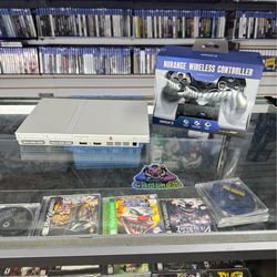 PlayStation 2 White Slim with Wireless Controller $180 Gamehogs 11am-7pm