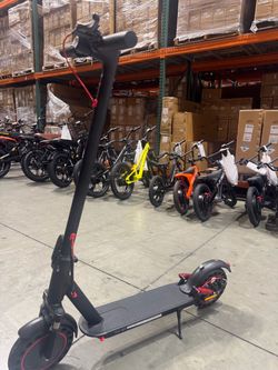 Front and rear shock-absorbing electric scooters