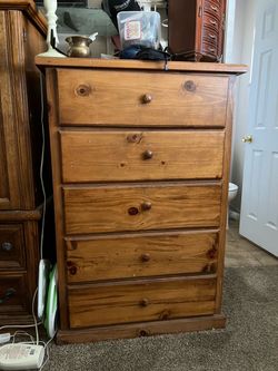 Tall wood dresser