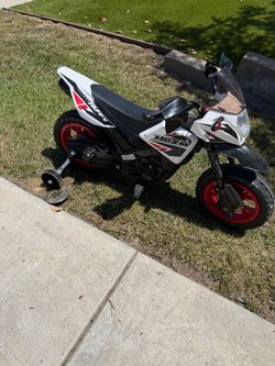 BARELY USED - Huffy Rechargeable Ride On Motorcycle for Kids