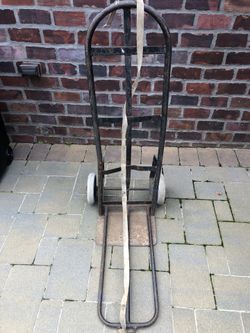 SOLID STEEL HEAVY DUTY HAND TRUCK MADE IN THE USA!!!!!!! Heavy, buyer must be able to haul alone or with helper!