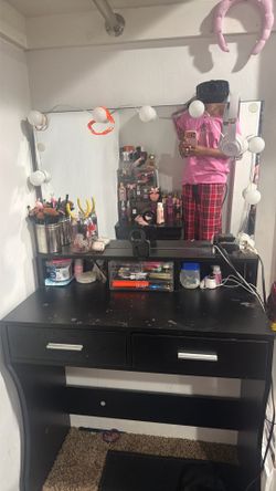 Bed,sheets and pillow ,vanity chair and vanity