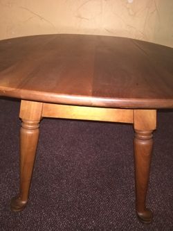 Very nice wood Coffee table. Both sides fold down.
