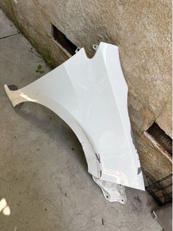 Dented 2016 Toyota corolla passenger fender