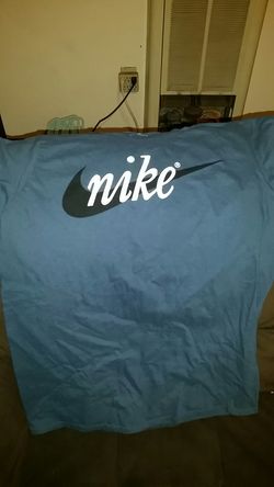 Blue Nike shirt