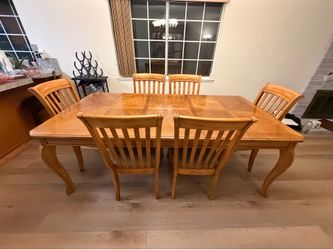 Solid oak dining table and chairs and hutch