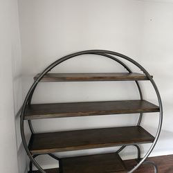 World Market round burnt alder and metal bookshelf