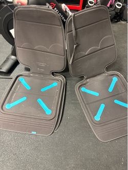 2 car seat protectors/ covers. Munchkin bricks brand. Retails for $25+ each