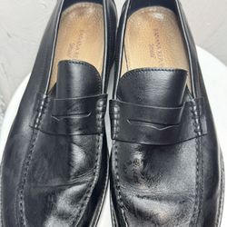 These are black leather Banana Republic Ortholite penny loafers for men. They are made of leather and feature a comfortable Ortholite insole.