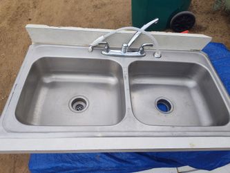 Stainless steel double sink with etc