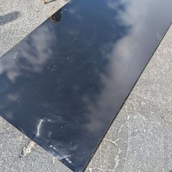 High density MDF with gloss black vinyl glued to one side