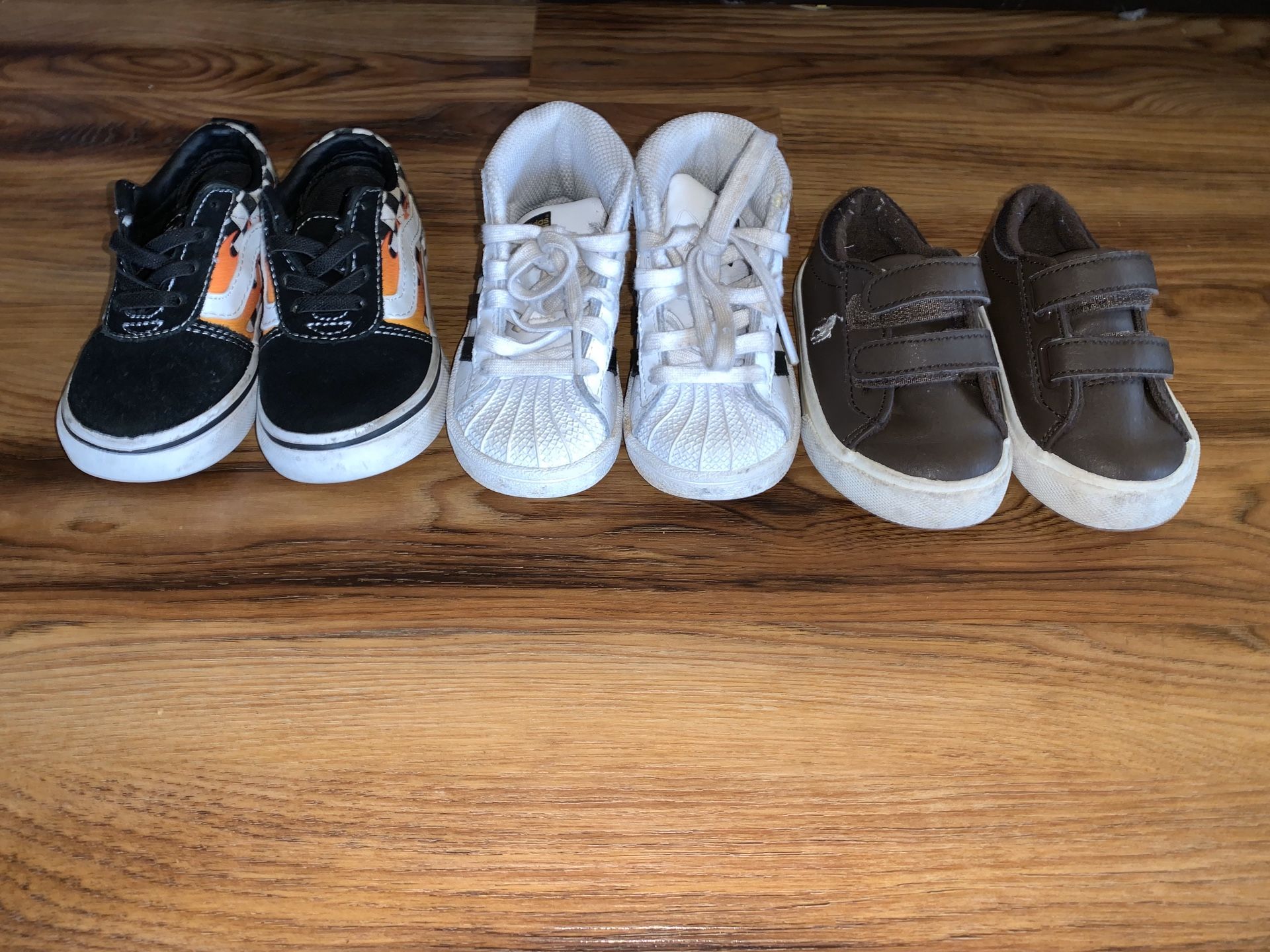 Toddler boys shoes vans, adidas, and polo