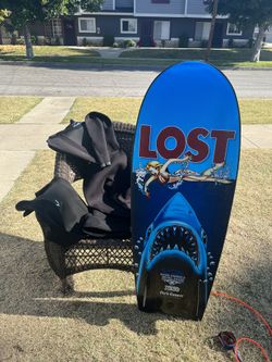 TWO WET SUITS AND A SURF BOARD !! CANT BEAT THE PRICE !! $300 OBO