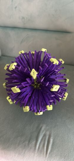 Hoberman sphere expandable breathing ball