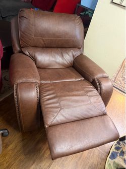 Brown reclining couch leather and swivel