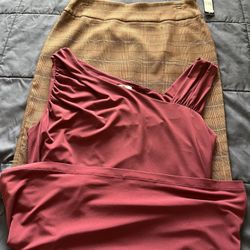 There Is A Two Pieces A skirt size, small and the blouse size large the color is burgundy, and the skirt is brown & Burgundy stripe both for $25 total