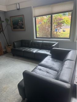 Gray leather Macys Couch and Loveseat