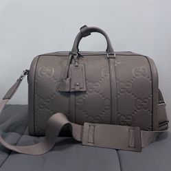 GUCCI- JUMBO GG SMALL DUFFLE BAG