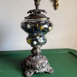 Vintage candy jar full of marbles