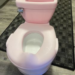 Summers potty training toilet with wipe storage and flusher