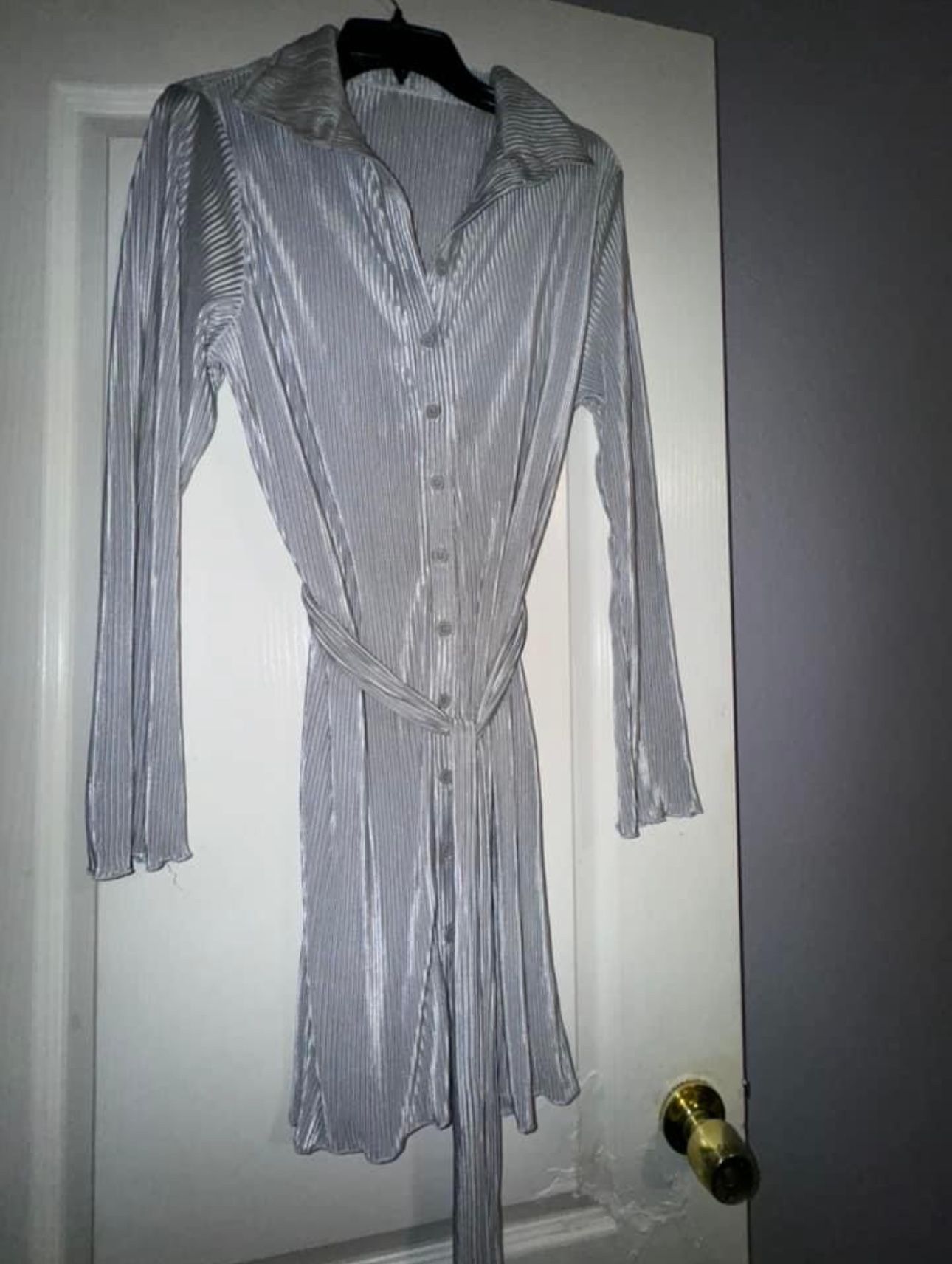 Brand new Size (Large)Classy Silver button up can be worn as a Top or Dress 