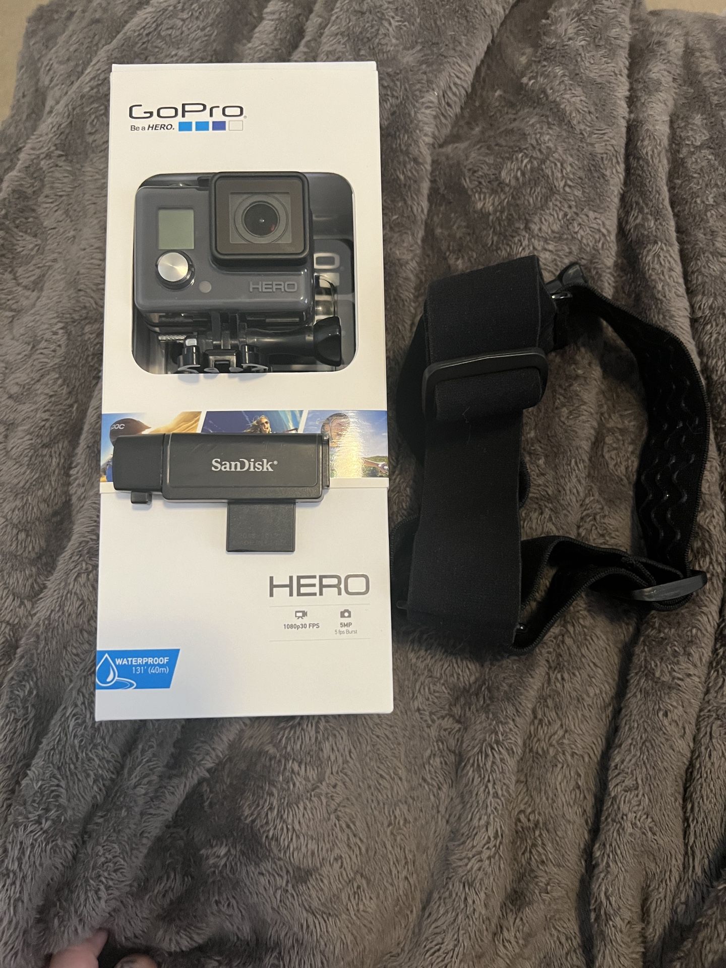 GoPro HERO black with sims & adapter, head band, chord in box