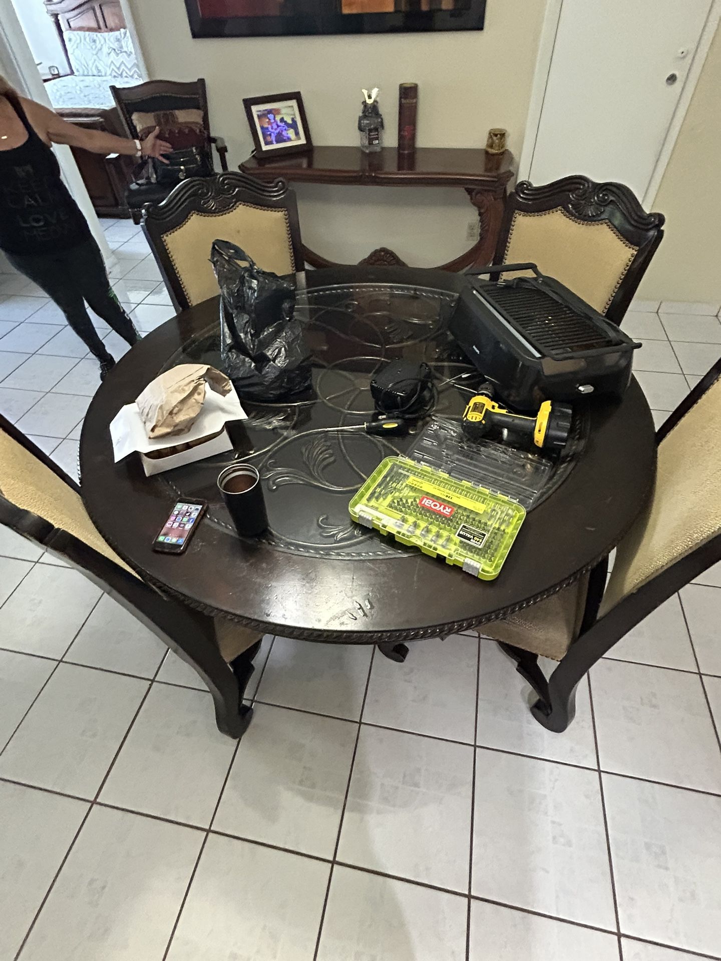 couch, tv, tv stand, dinning table with chairs, recliner