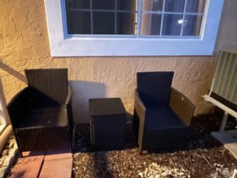 Rattan patio furniture set. Fair condition.