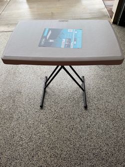 Adjustable height table