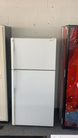 Ge top and bottom fridge with warranty