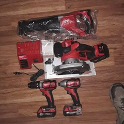 Milwaukee M18 4 Tool Kit With Three Batteries Charger And Carry Bag